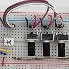 Serial Wombat 4B chip with 3 potentiometers on a breadboard