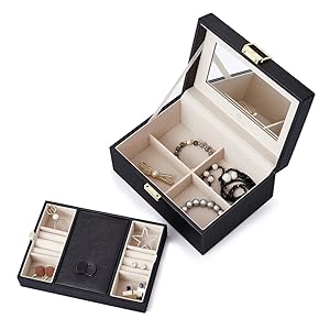 It holds either small or larger jewelry with removable division.