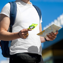 Hiker Reads Compass and map
