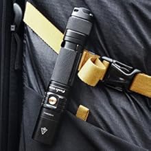 UC35 v2.0 clipped onto a backpack