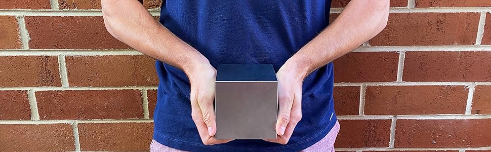 tungsten cube hands hold heavy dense desk toy density weight metal 