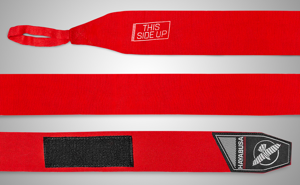 Image of red hand wraps showing this side up label and velcro closure