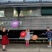 punching party balloons
