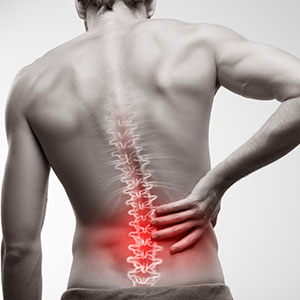 Man having back pain in lower region