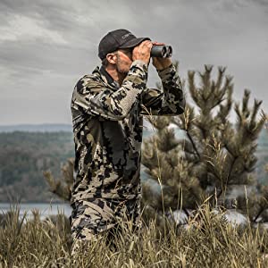 Hunter looking through the Bushnell Engage EDX Binocular