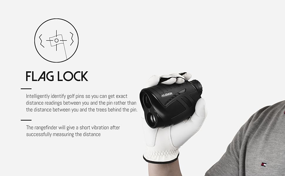 a hand holding a rangefinder