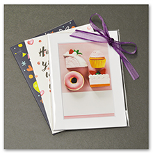 white mat with backing clear bag with art print picture card