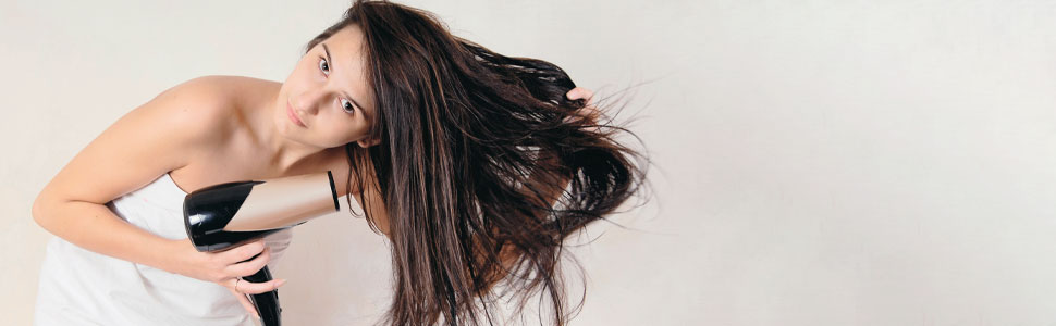 ENJOY HAIR CARE Woman with blow dryer