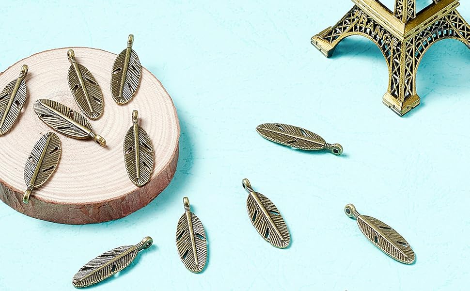 antique bronze angel bird wing feather charms