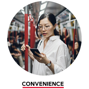 Woman on train using smart phone. Convenience.