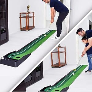 a man is teaching his child to play the putting mat