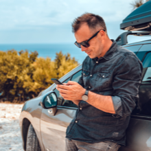 Driver Wears Sun readers to see cell phone