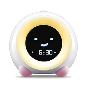 Blush Pink MELLA Sleep Trainer on Play Mode with Yellow Light