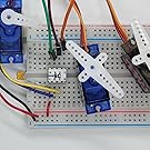 Serial Wombat 4B chip on breadboard with servos