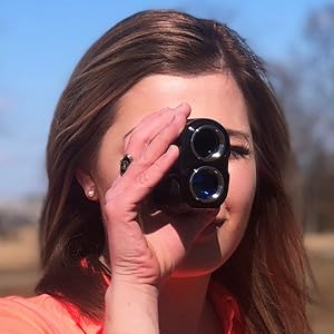 Girl Holding Rangefinder