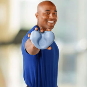 Man holding the CranioCradle Sport Deep Tissue therapy device.