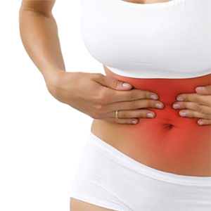 Fit woman with stomach and digestive problems