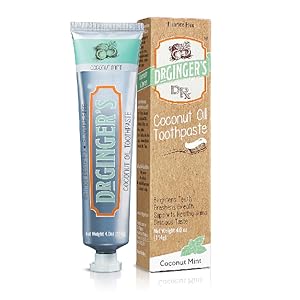 Dr. Ginger's Coconut Oil Toothpaste Tube and Packaging Box standing upright.