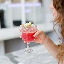 A woman enjoying her drink