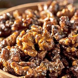 akhrot dipped in honey roasted with sugar syrup for sweet mithai in festival