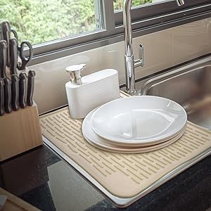 Dish drying rack next to sink