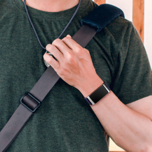 a man with a black woven band