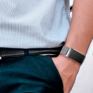a man with a charcoal woven band
