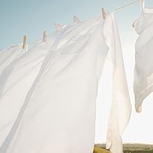 Surrounding warmth of a sun-lit afternoon fills you with comfort as soft as line-dried linens