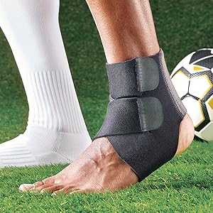 person wearing ankle support while playing soccer or futbol