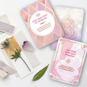 cards face up on table with flower and crystal