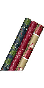 Rustic Christmas wrapping paper in burgundy, green foliage on navy blue, and Victorian Santa