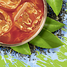 Image of a cup of black iced tea with leaves
