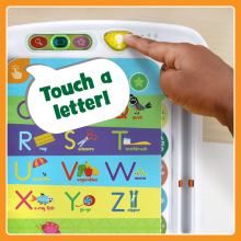 Child’s finger presses the hint button. Talk bubble says “touch a letter!”