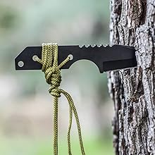 knife stuck into tree