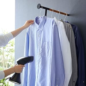Leaning Clothes Hanger displayed in a modern home