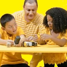 Happy family playing with Cubelets robot blocks