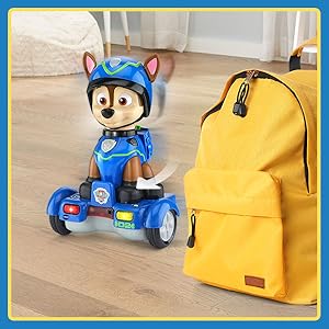 Smart sensors sense the backpack on the floor. Toy rolls around the backpack.
