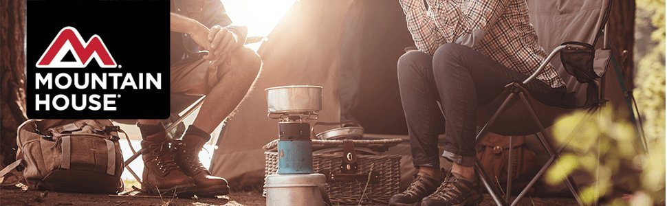 Mountain House top banner image of two people camping eating meal together outdoors