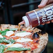 mike's hot honey sweet spicy honey with a kick condiment hot sauce pizza mozzarella basil