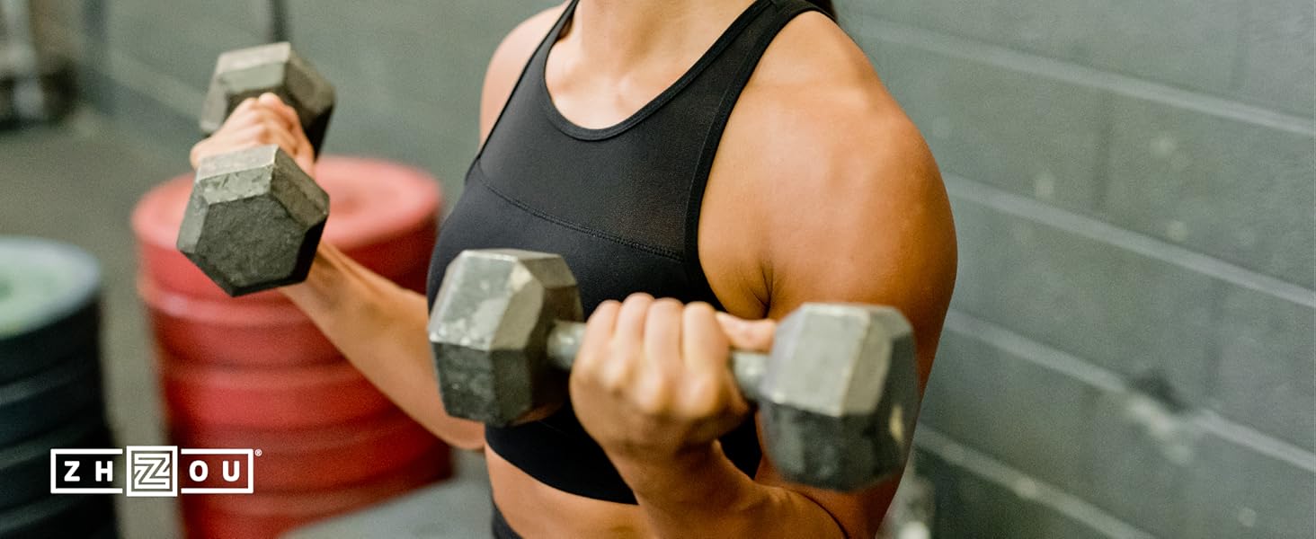 young female lifting weights, and performing at her best, thanks to keto drive 