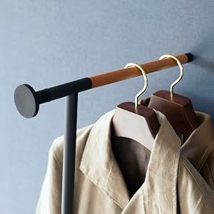 Leaning Clothes Hanger displayed in a modern home