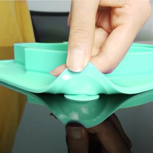 baby placemat with strong corner suction cups to stick table and reduce spills