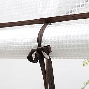 Treibhaus mit aufrollbarem Eingang