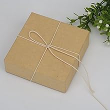 Gift wrapping christmas gift package twine cord string tied photo