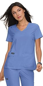 model wearing koi Basics 373 Women's Scrub Top V-Neck 