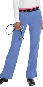 model wearing koi Lite 720 Women's Scrub Pant