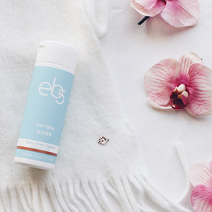 eb5 toner on blanket with flowers