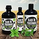 tea tree and spearmint oil pulling mouth rinse with activated charcoal