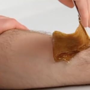 Step 2: Flick Fast Against the Hair Growth