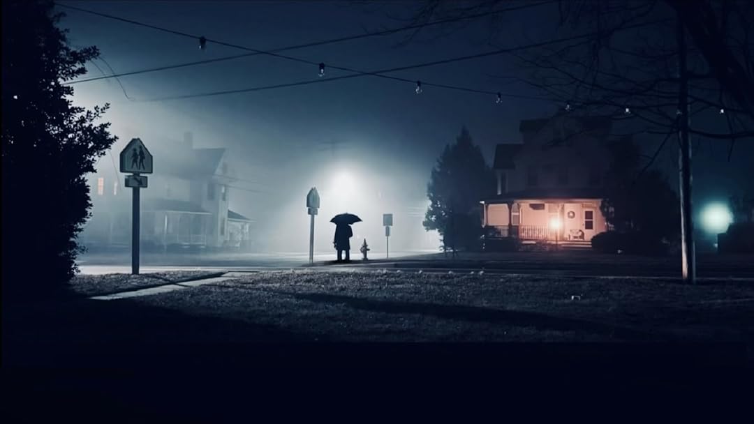 The man with the black umbrella